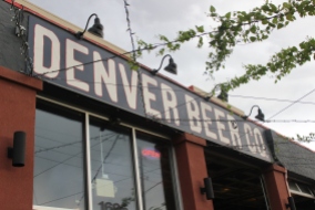 Denver Beer Co. in all its hoppy vine glory. There were hops growing straight out of planters and shading the patio area, which was a nice touch.